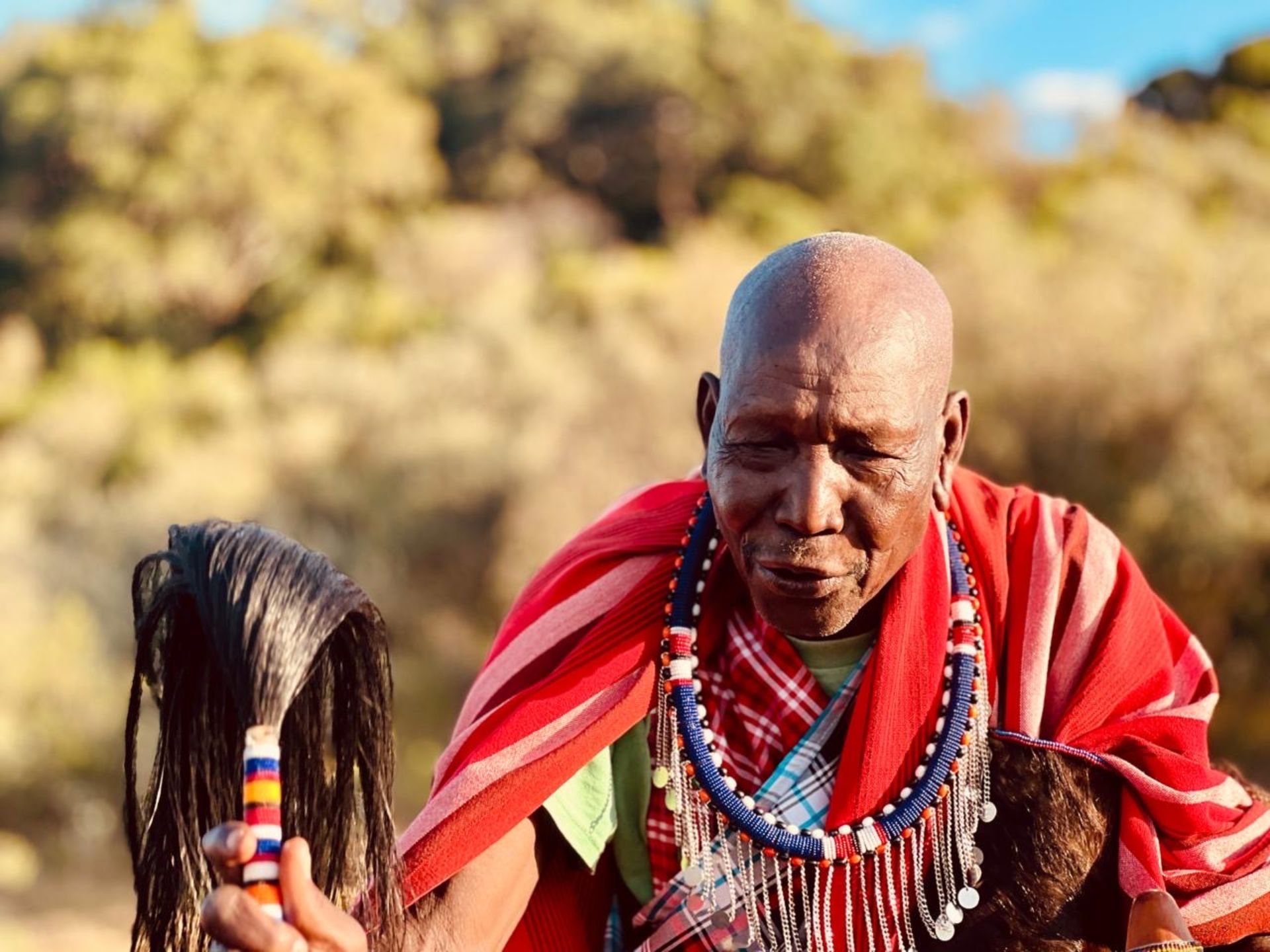 A Maasai elder leads the naming ceremony...