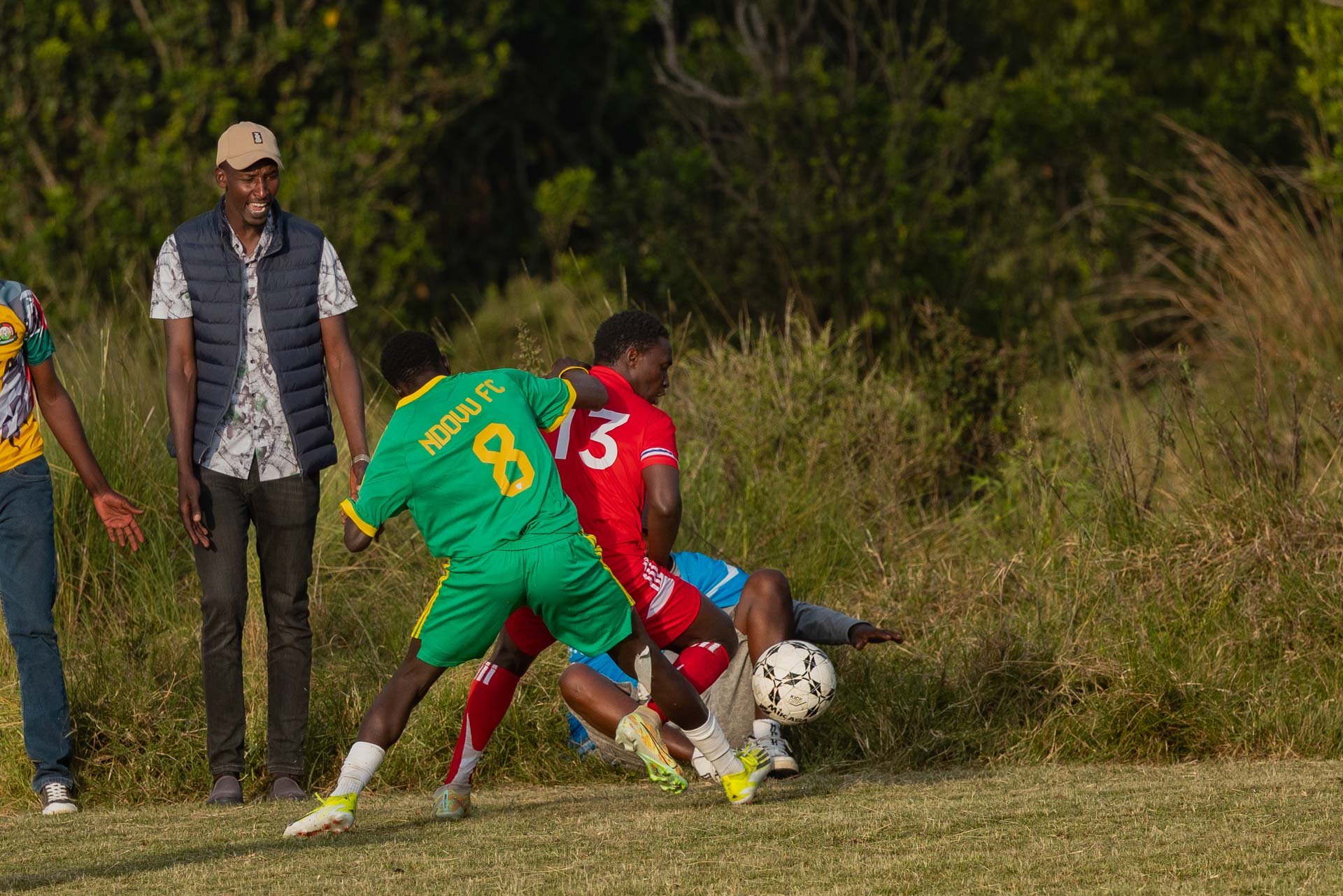 A fierce touchline battle between Kichwa Tembo in green and Angama Mara in red
