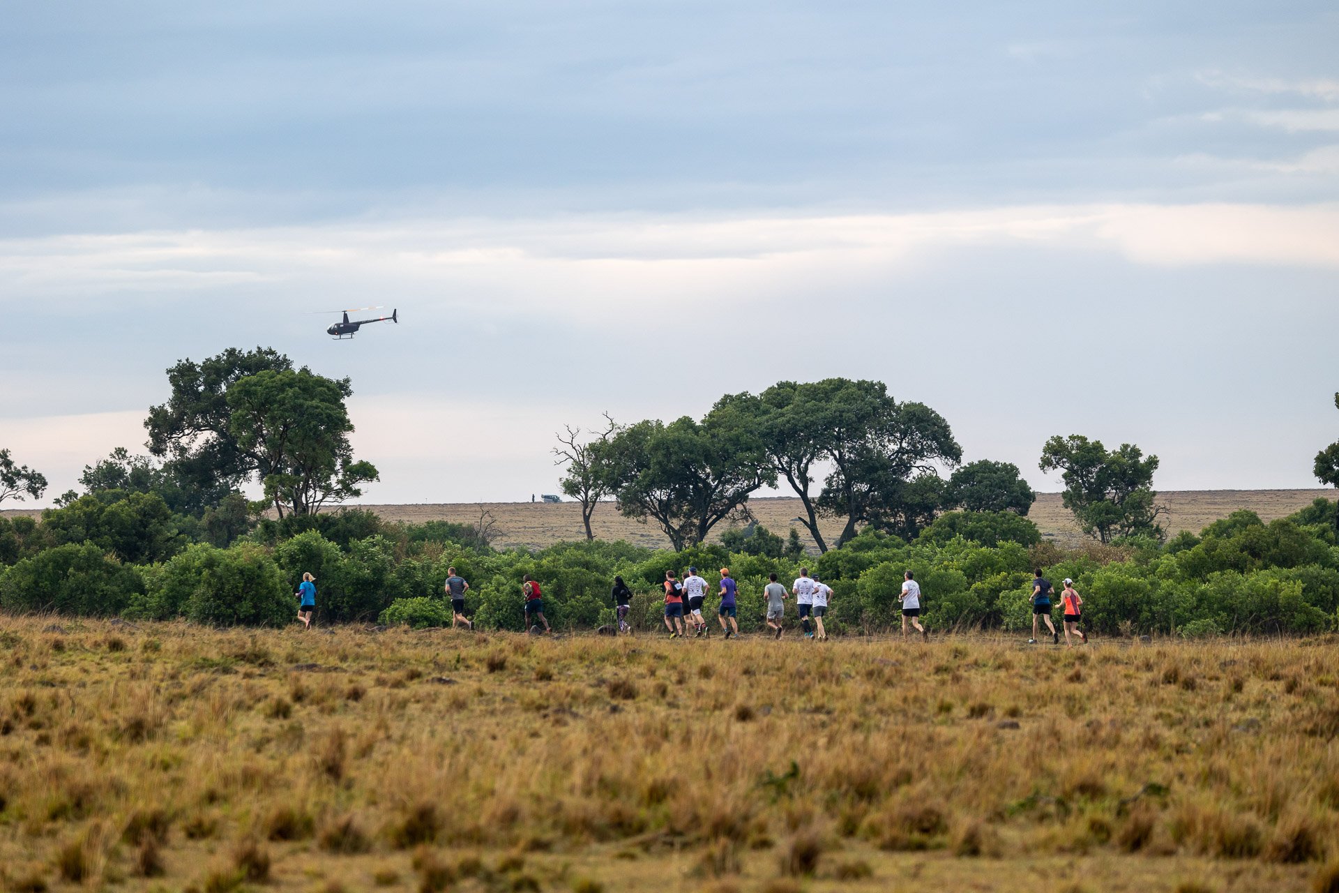 Above: Airborne safety net, eyes on the runners