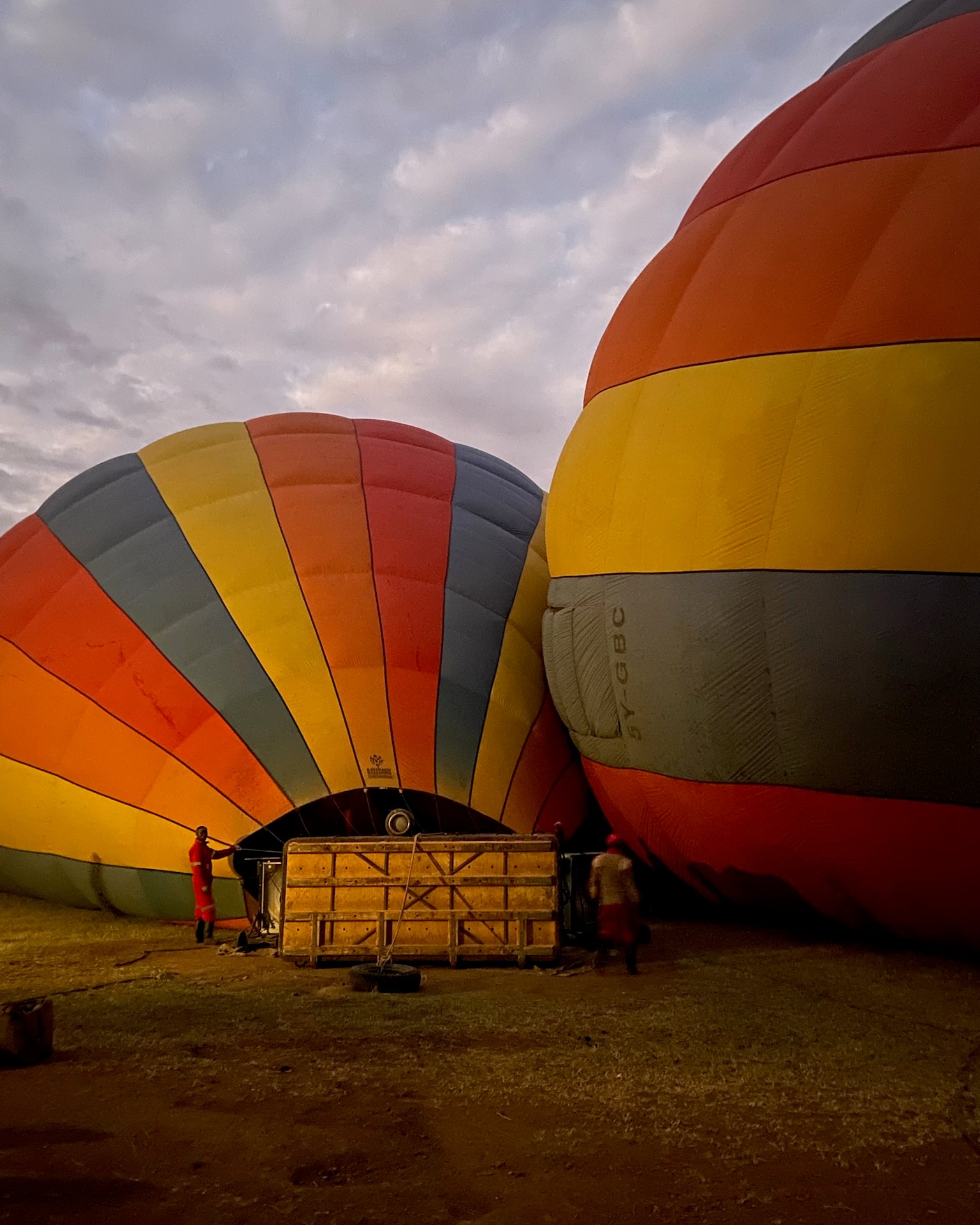 Excitement grows as your hot-air balloon inflates, ready for a sky-high safari