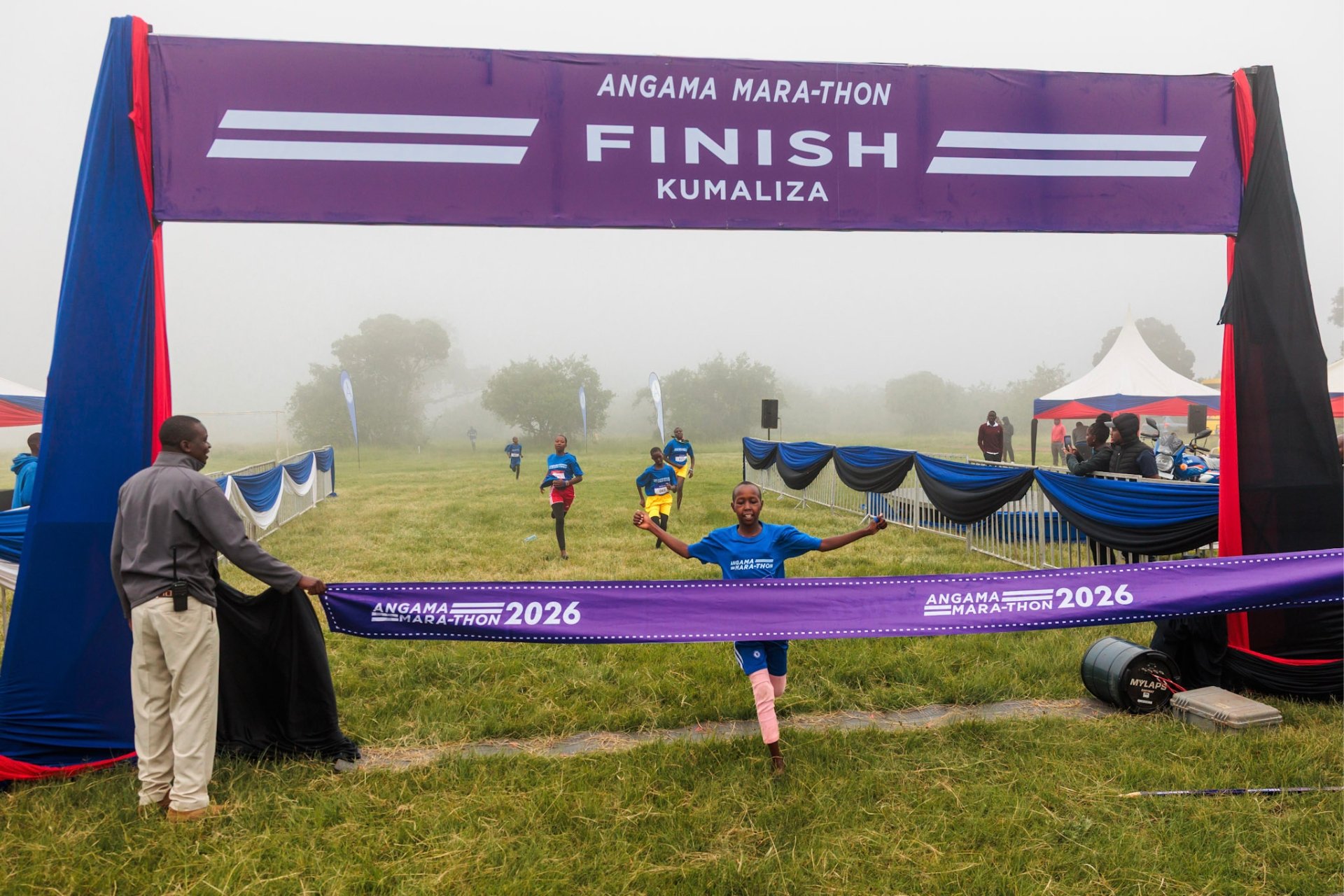 Young runners sprinting to the finish line