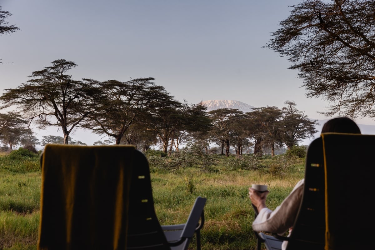 A mother winds down and watches the ice caps melt off Mount Kilimanjaro