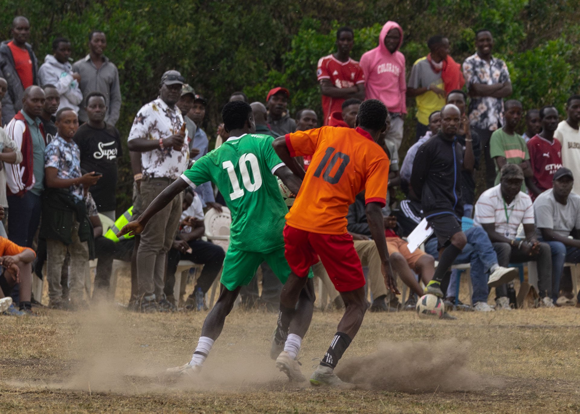This pitch isn’t for the faint-hearted, dust flies, tackles crunch all in front of die-hard fans