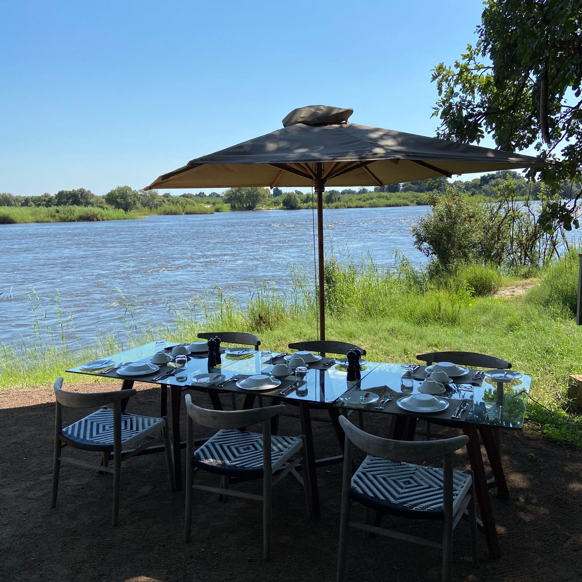 A riverside breakfast after an early safari at Matetsi, Zimbabwe