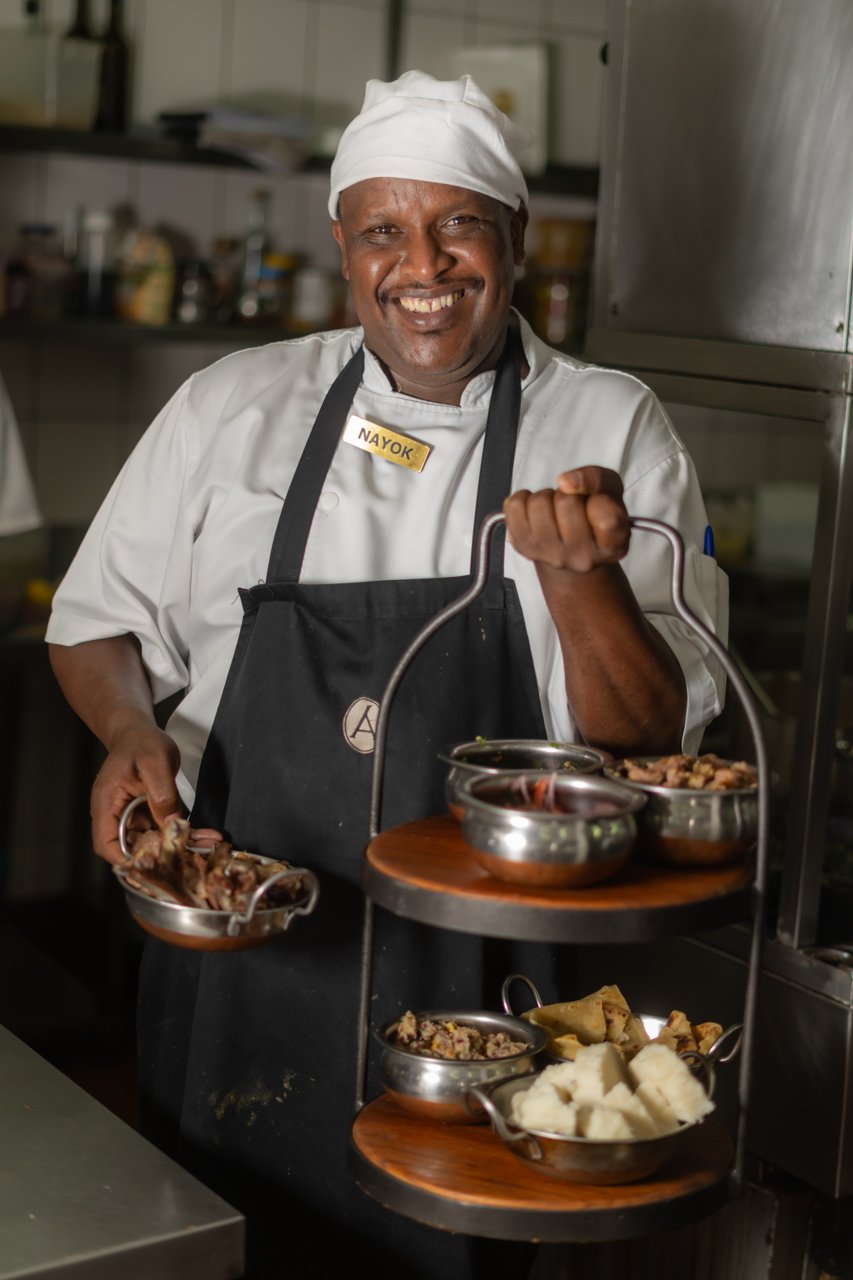 Nayok plating the platter for guests