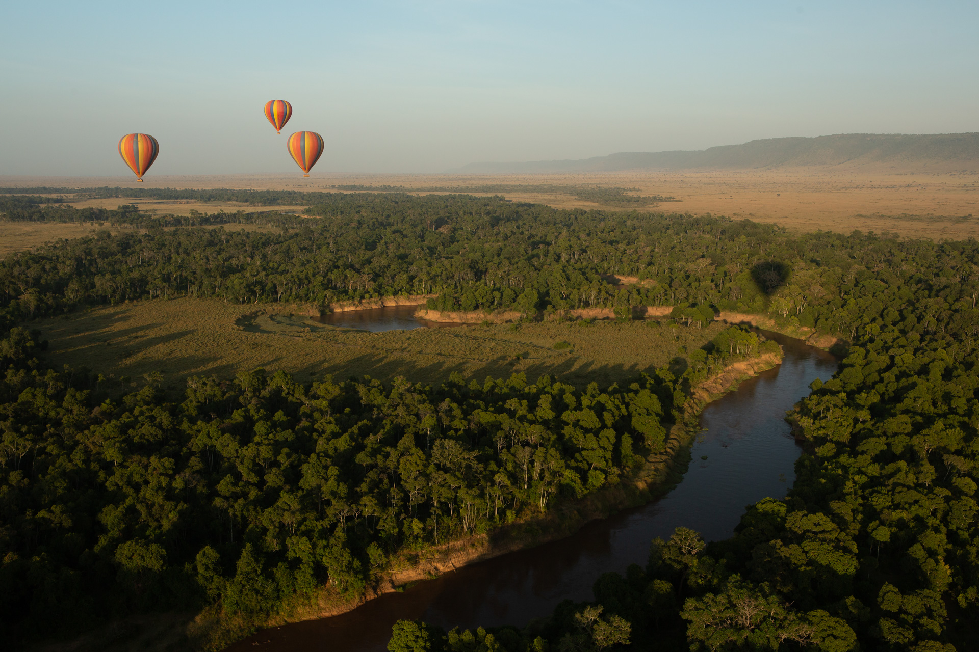 hot air balloons and river
