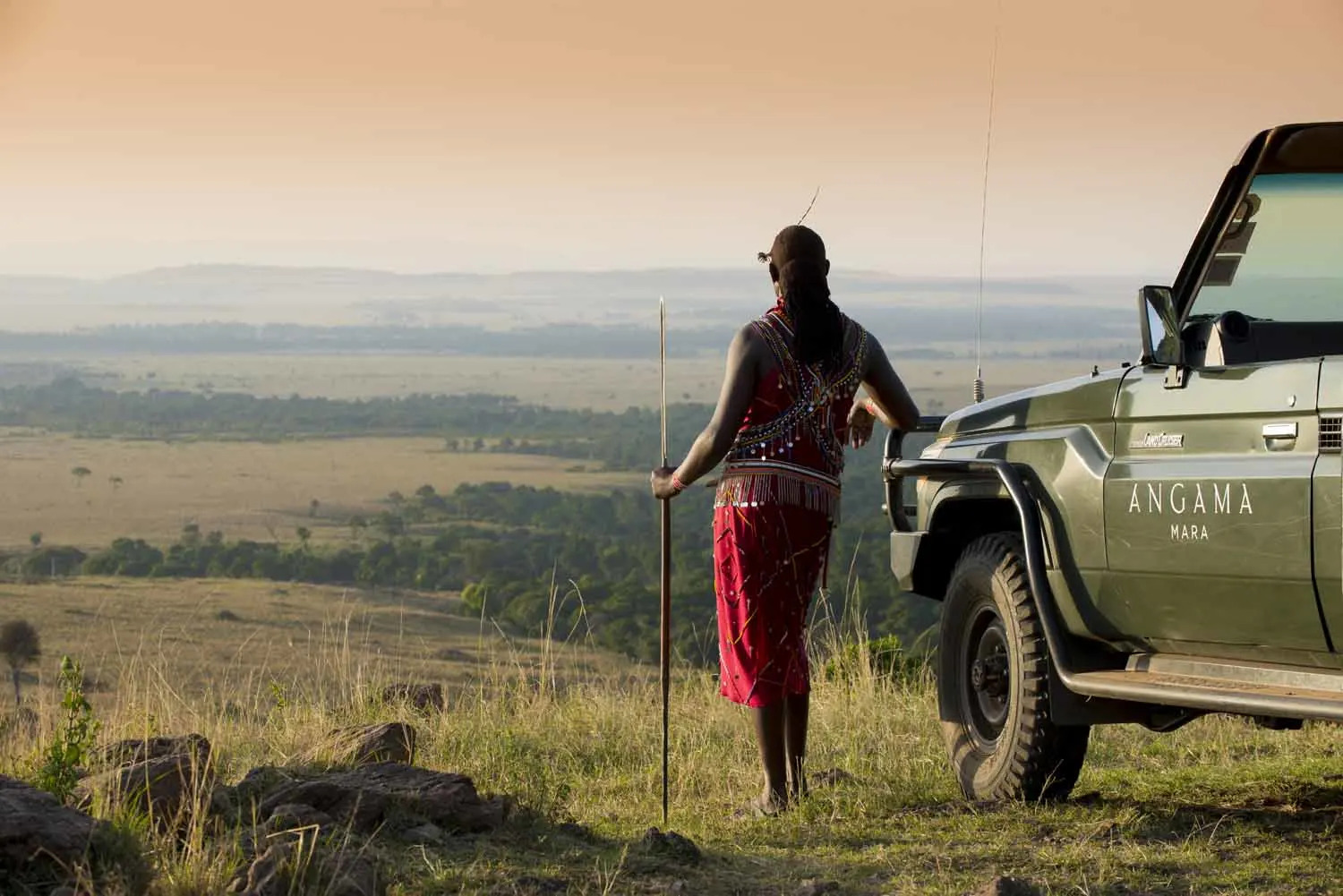 Askari with vehicle and view