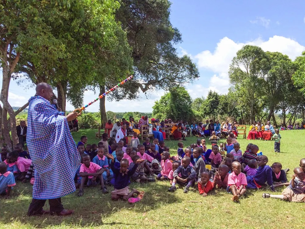 Shadrack addresses the children at Partakilat School