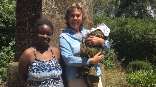 Nicky, Damaris and her baby in front of Denys's obelisk