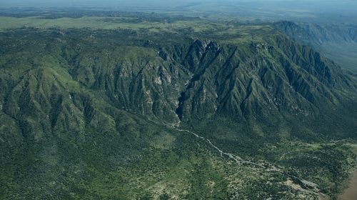 Flying down the escarpment towards Lake Eyasi