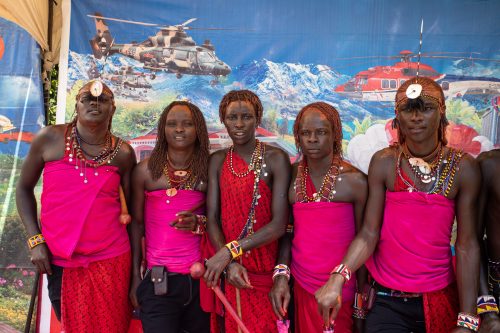 Maasai warriors posing at the very festive photobooth