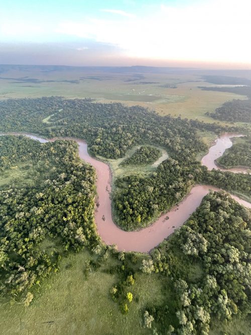 Floating over the Mara River in a hot air balloon