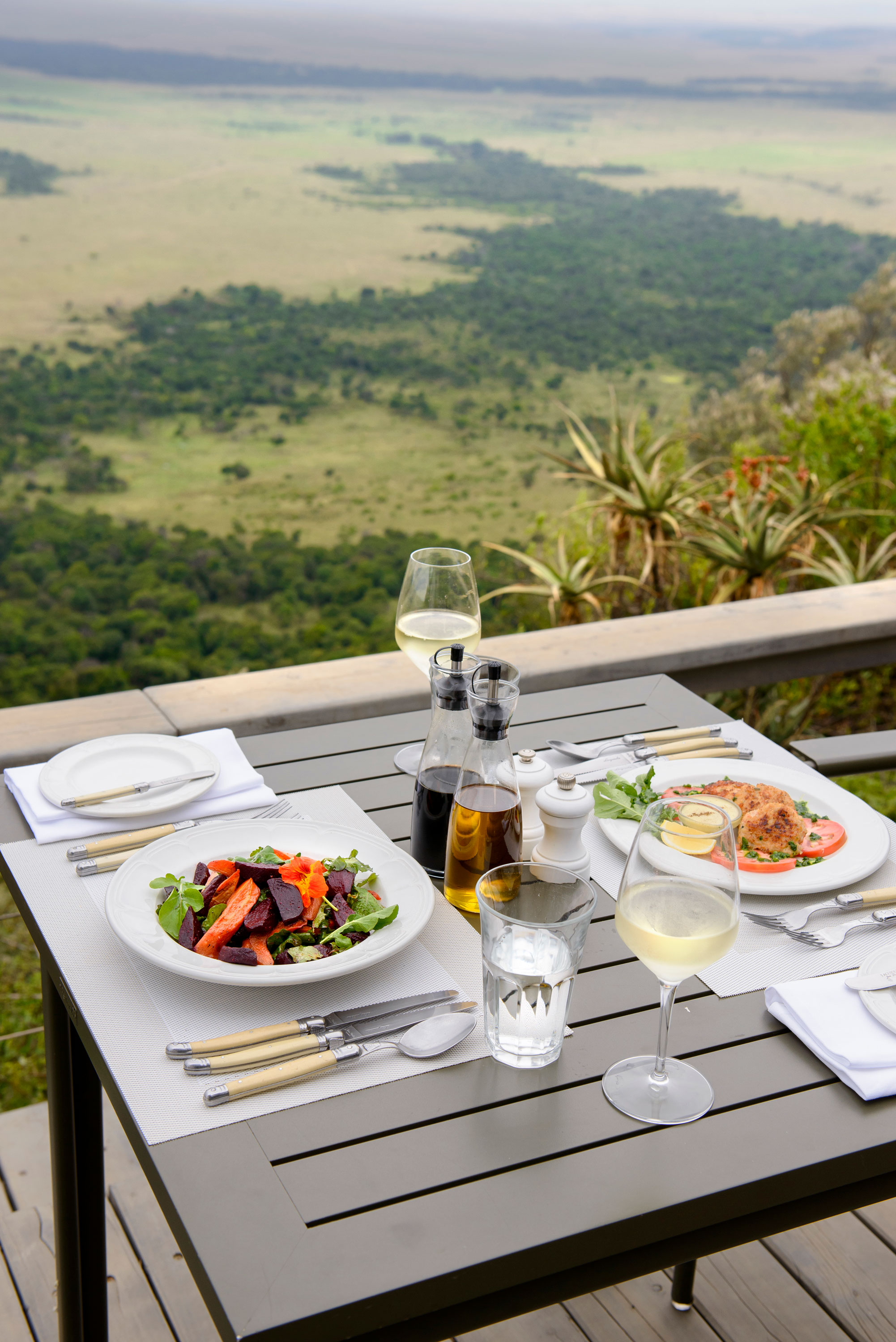 Lunch at Angama Mara with views of Maasai Mara