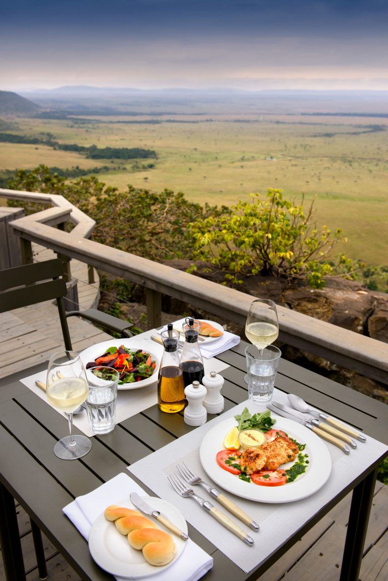 Dining at Angama Mara with views of Maasai Mara