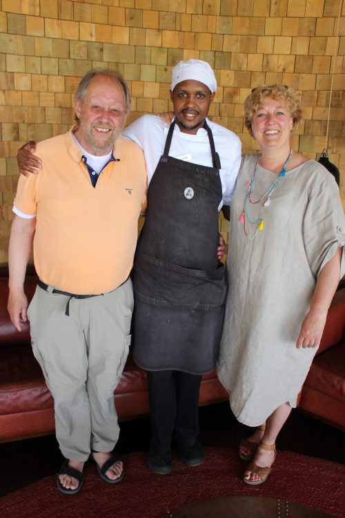 Chairwoman Mariska Appelman and her husband with former MEC student Jackson, now a chef at Angama Mara