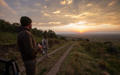 Capturing his first sunrise on the road down into the Mara 