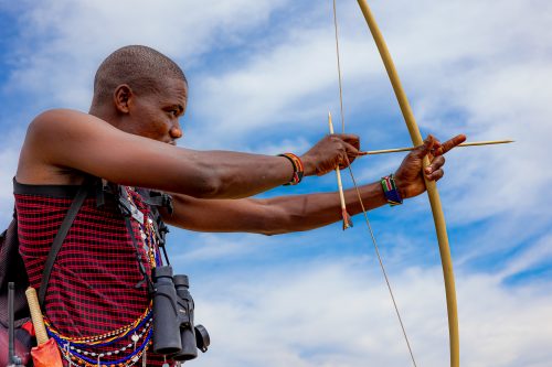 Patrick, a Maasai naturalist at Angama, demonstrates his skill