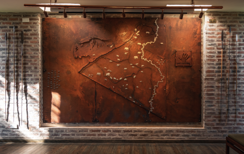Securely in place, our lovely steel map will welcome our guests for years to come