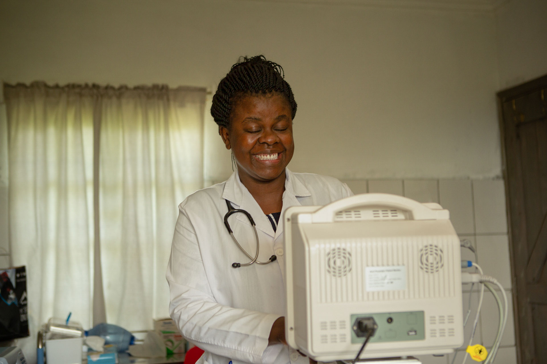 Dr Irene is all smiles with her new equipment 