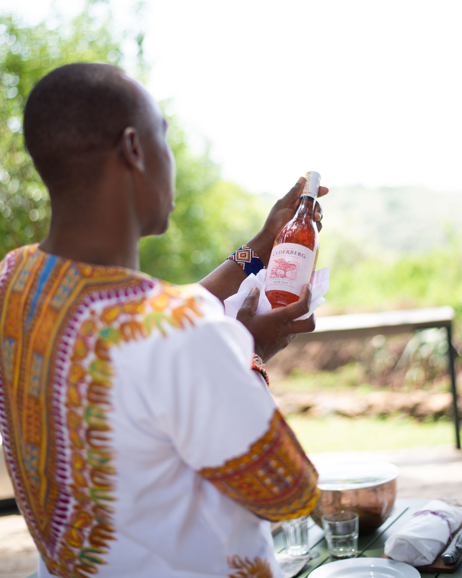 Sadera inspects a bottle of Cederberg rosé (it passes with flying pink colours) 