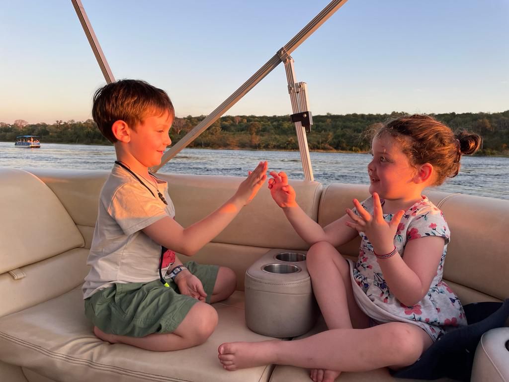 Willow and Anna play retro games while floating down the Zambezi