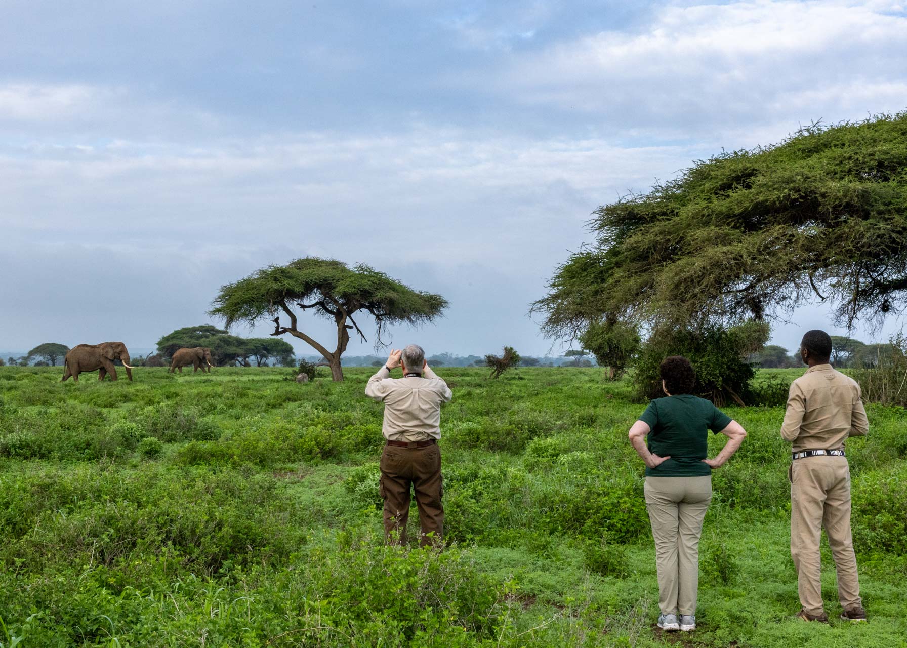Paul, Claudia and Jeremy enjoy new perspectives on a walking safari through Kimana Sanctuary 