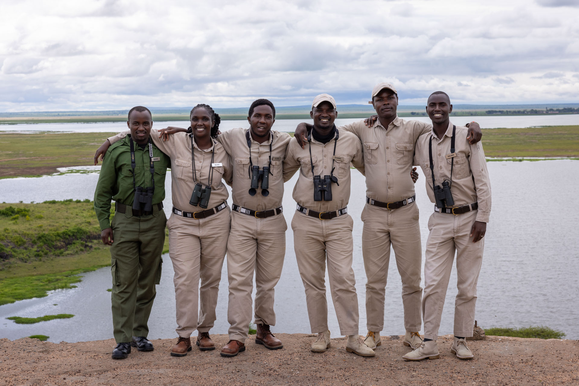 Moses (in training), Alice, Elvis, Daniel, Jeremy and Salash arm-in-arm