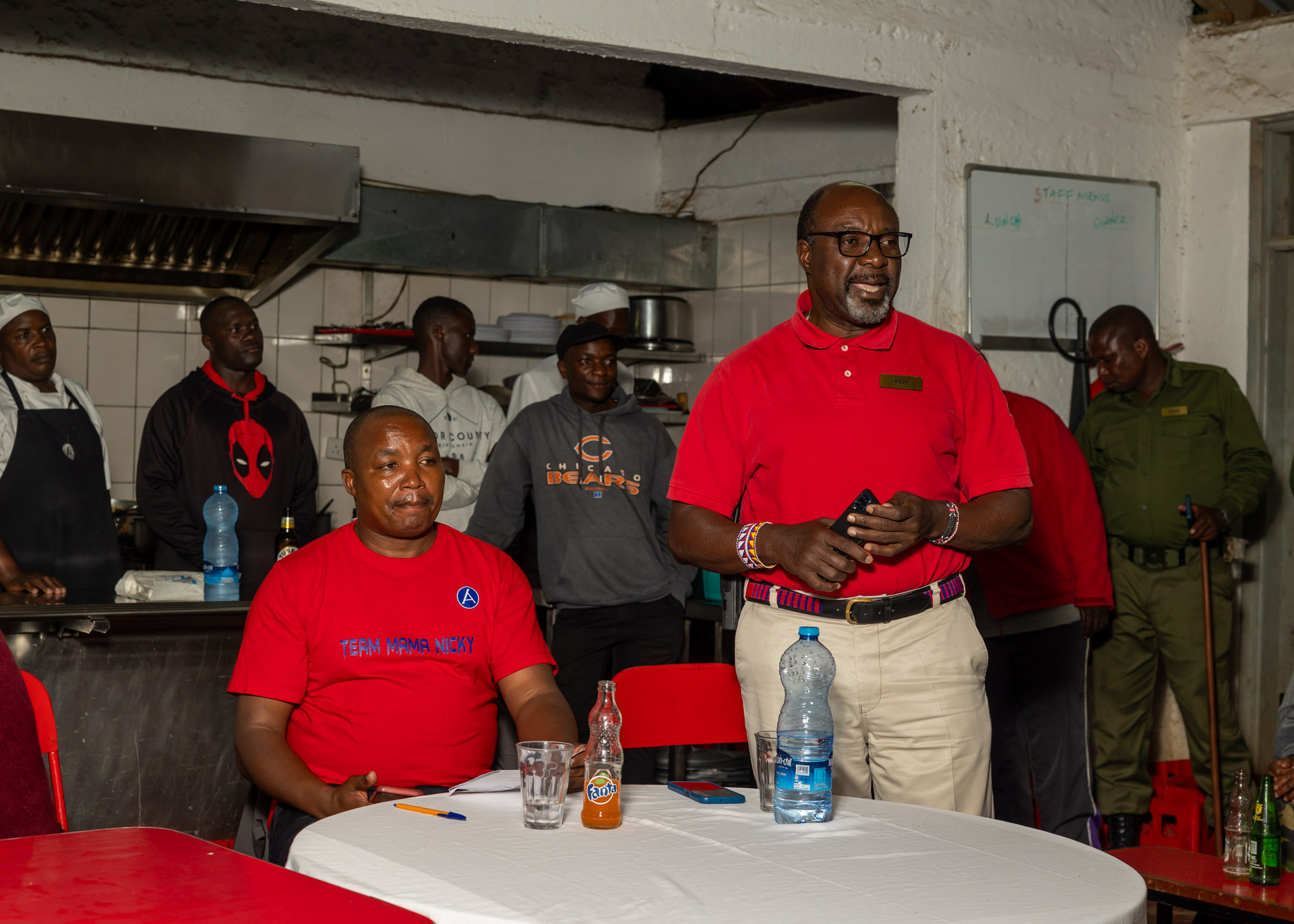 Ken Mambo, Angama Mara's General Manager, gives a speech with Chef Evans at his side