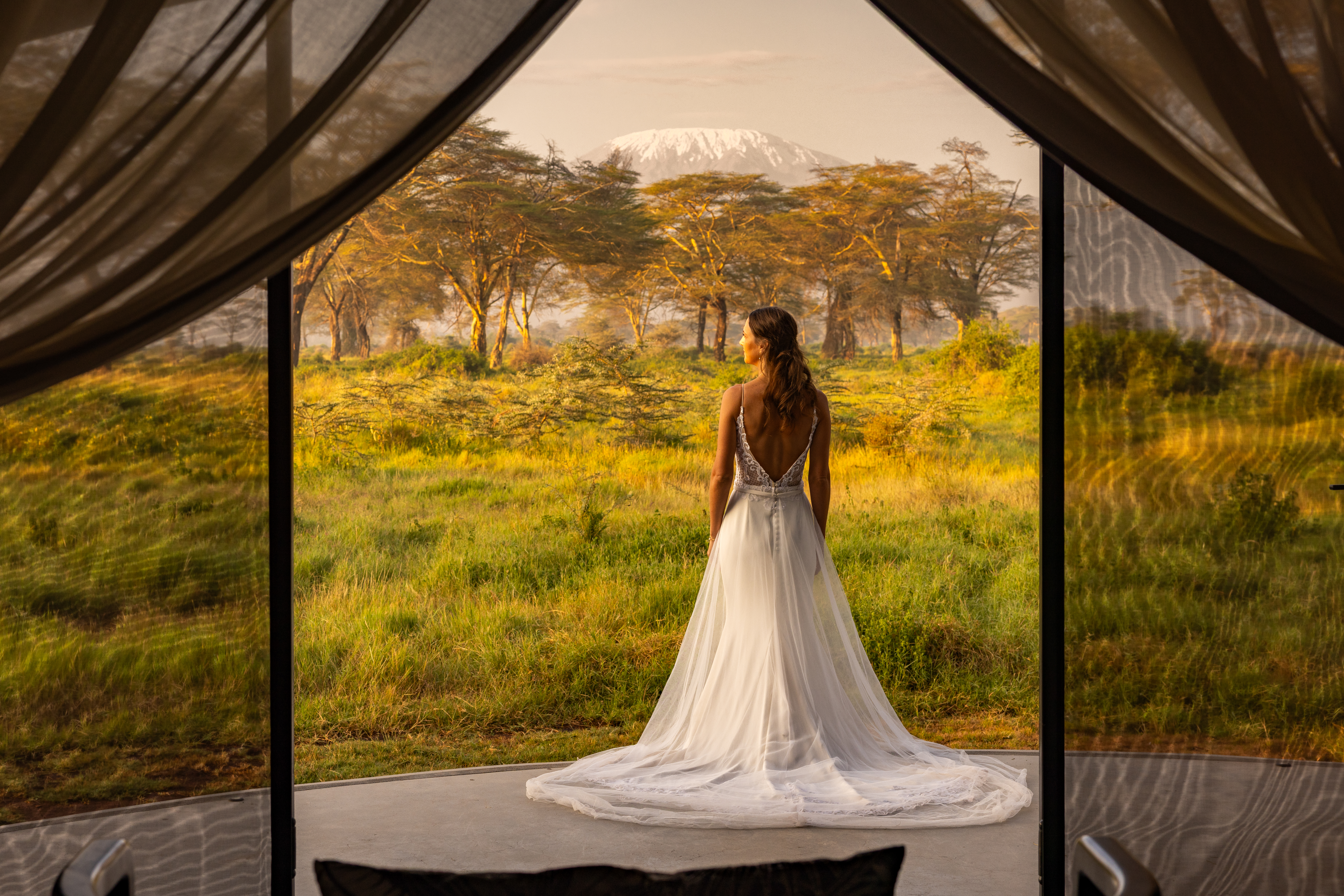 Above: Kilimanjaro keeps watch as Alita takes it all in from her Guest Suite